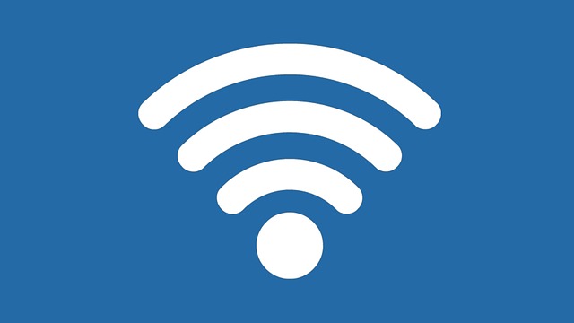 The icon for Wi-Fi, three semicircles echoing out from above a circle.