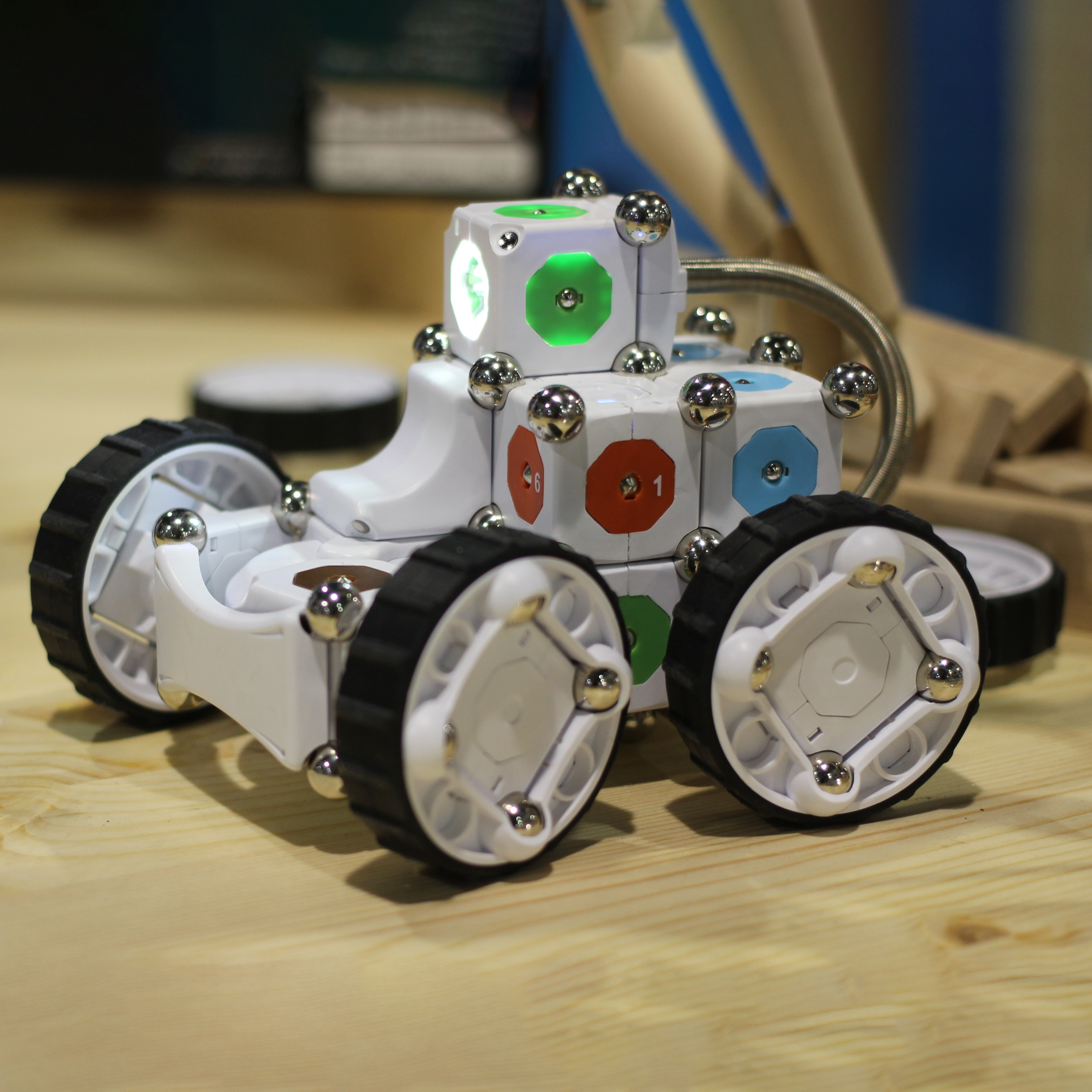 Cubelets Robot Car 02 A photo of a robotic car made out of cubulets, cube-shaped robots that can be snapped together to make robots that behave in different ways.